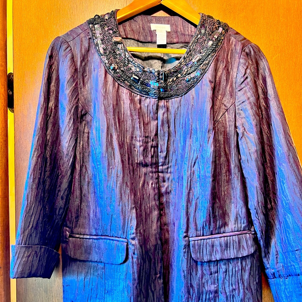 Beautiful Chico’s purple jacket. Size 2